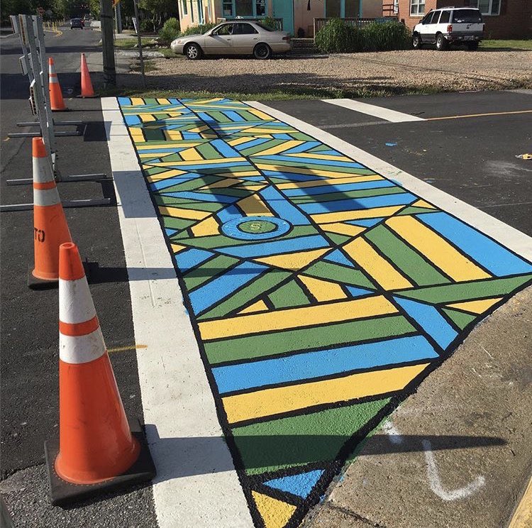 ScubaSteveArt's tweet photo. Gm to the first mural I painted back in 2016 for $200.

A couple years after, the city approached me to riff on it to design the paver blocks of an entire intersection. 

Now my homie from highschool is the lead architect on a wave pool getting built at the intersection 🤯 https://t.co/zM2Ujl3gxN