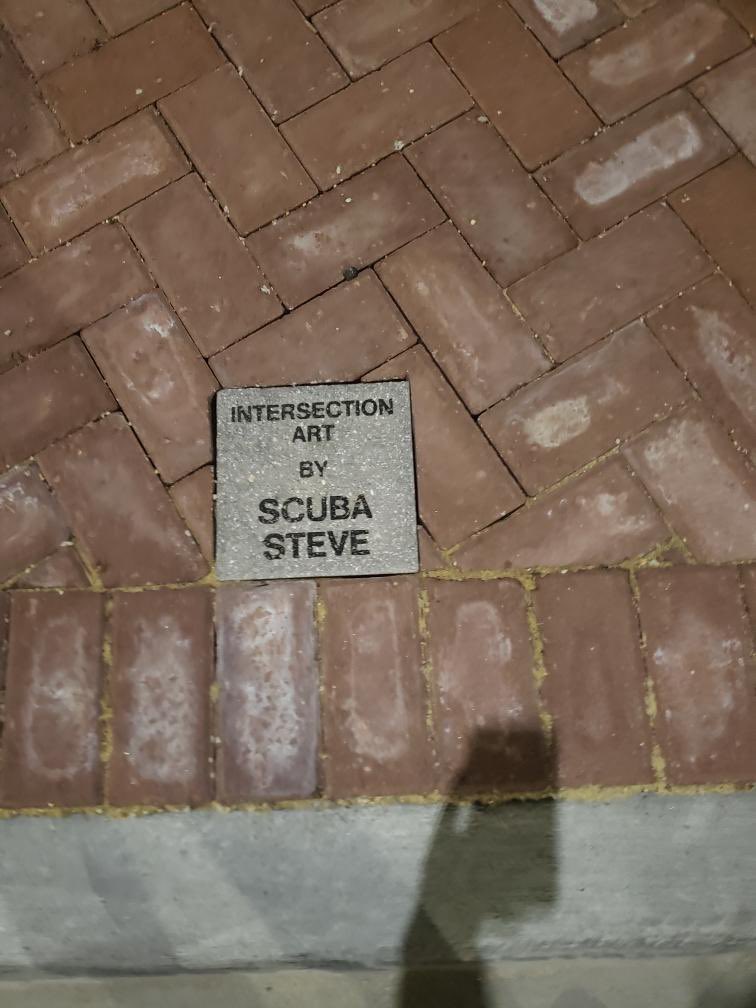 ScubaSteveArt's tweet photo. Gm to the first mural I painted back in 2016 for $200.

A couple years after, the city approached me to riff on it to design the paver blocks of an entire intersection. 

Now my homie from highschool is the lead architect on a wave pool getting built at the intersection 🤯 https://t.co/zM2Ujl3gxN