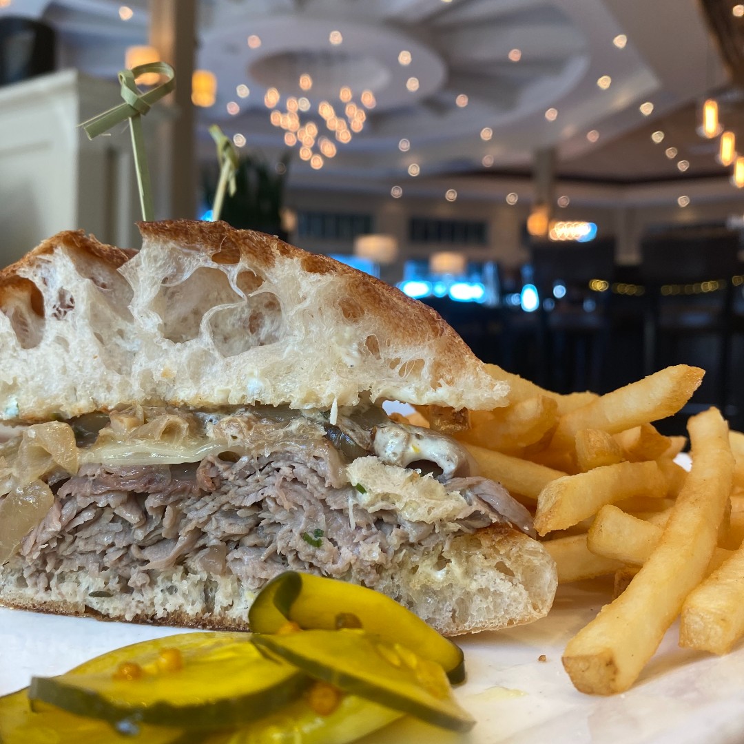 Have you tried our Roasted Sirloin French Dip yet? Served with cheddar, caramelized onion, horseradish aioli, and au jus on a griddled ciabatta - it's delicious!