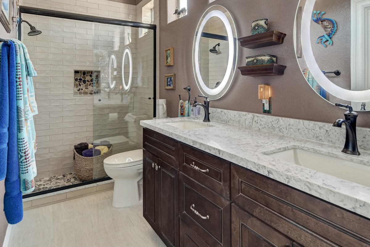 It's FINALLY summer time! There's no better time than now to give your home a face lift!✨

#lasvegasremodel #jackandjillremodel #bathroomremodel #showerremodel #tileshower #pebbleshower #darkwoodcabinets #doublevanity #modernhome