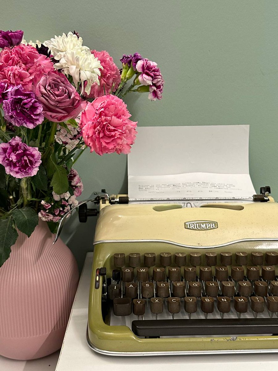 Basmawsb's tweet photo. The vintage green #Typewriter and the #PinkVase https://t.co/butZAWuES3