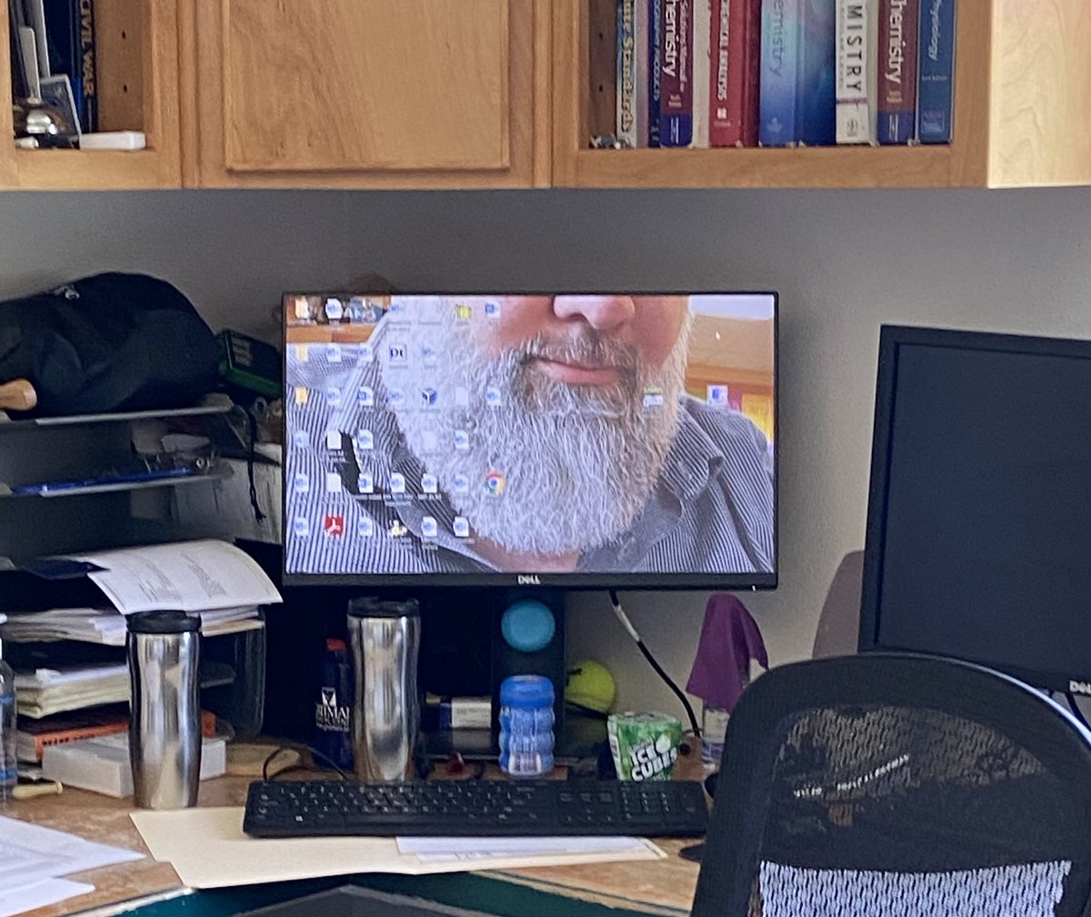 MaddyC1313's tweet photo. my coworker just changed his screensaver to a photo of his own beard? https://t.co/XZdwnIyHDG