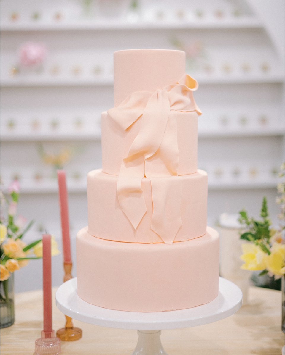 Bows make everything better - Emrie Smith, 5

Planning and design by <a href="/eventsbylafete/">La Fete</a>
Photo by @fabianaskubic
Venue: @merrimonwynne
Flowers by @bowerbirdflowers
Table and favor wall by @greenhousepickersisters

#sugareuphoria #raleighbakery #weddingcake #raleighweddingcake