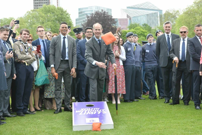 The Duke playing garden games with Award holders.