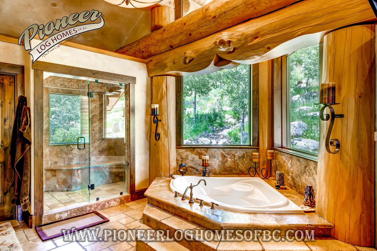 After a long hard day nothing beats a hot soak and a glass of your favorite wine while you unwind in your very own, custom, Western Red Cedar log home - am I right?🍾🍷 #relaxing #westernredcedar #customhomes #bathroomdesign #loghome #custommade #handcrafted