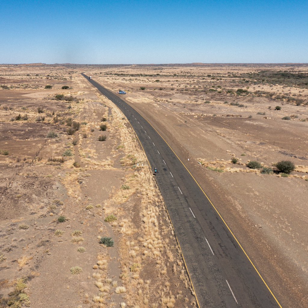 hardestgeezer's tweet photo. #ProjectAfrica Day 24: 60.1km

On road. Look up. Desert. Look down. Tarmac. Carry on for 20km. Stop. Boys throw a variety of edible objects at me. I inhale. No chewing. Inefficient use of time & energy. 

Back on road. More desert. Hold tight another 20km. Stop. Drink juice. Eat biscuits. Go for poo. Deep squat. Back on road. Final 20km. 

Stumble into van. Eat everything in sight. Have baby wipe shower. Talk tactics for 1v1 lion combat with boys. Go bed. Repeat.