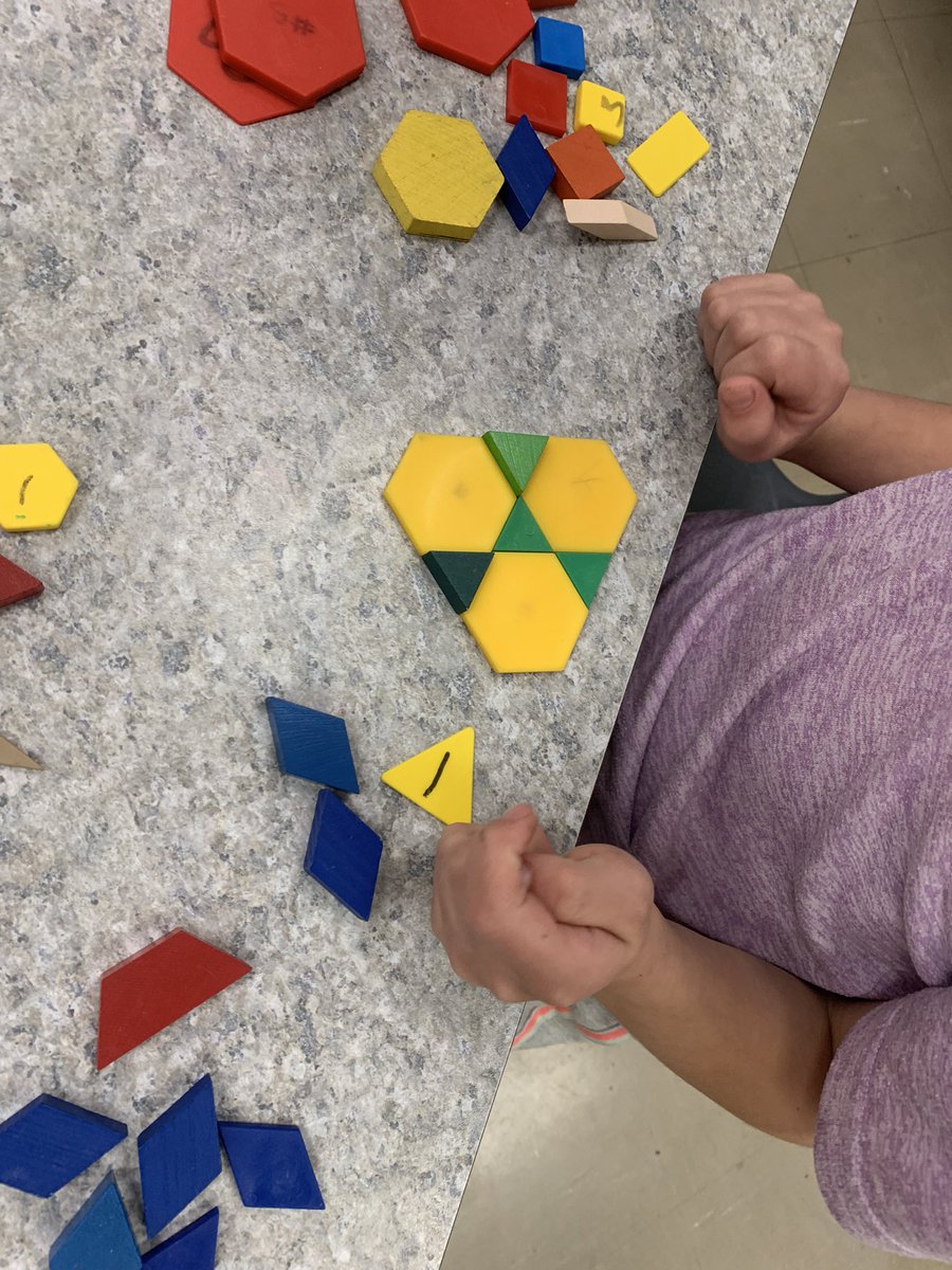 We are reviewing shapes this week. We have discovered that we are experts at making shapes out of different shapes!