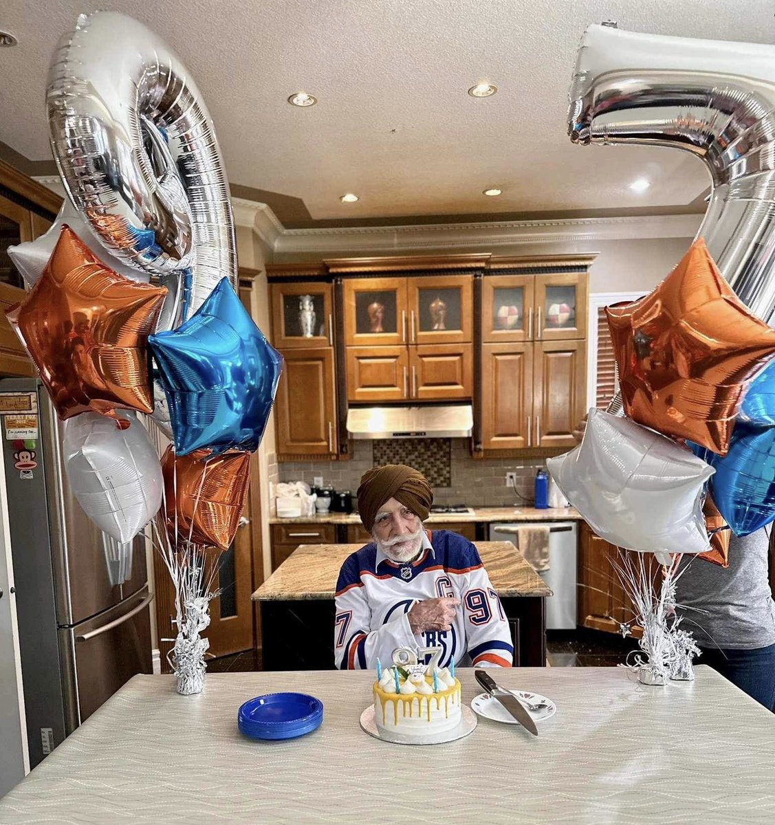 RandipJanda's tweet photo. The Oilers lost last night, but there is still a reason to celebrate for one Oilers family.

This is Edmonton resident, @HkyNightPunjabi viewer &amp; @EdmontonOilers fan Karam Singh Janda, who celebrated his 97th birthday with his family on Saturday wearing @cmcdavid97’s #97. https://t.co/wc2X5gnkMk