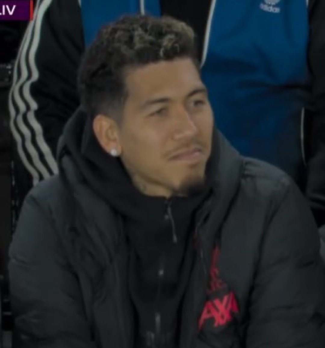 AnythingLFC_'s tweet photo. Roberto Firmino listening to his song being sung at the King Power Stadium 😁 https://t.co/eQD3pesD9U