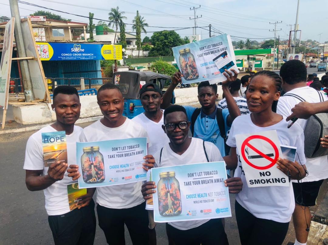 jr_sankoh's tweet photo. #WeNeedFoodNotTobacco 
#DrugAwarenessWalk
Yesterday the #Health #Minister Department of the SDA Church S/L #Conference organised a Drug awareness walk in Freetown. We shared drug awareness flyers with #SDA health and spiritual hand books to pedestrians,business people and youths. https://t.co/bBykUHQgKI