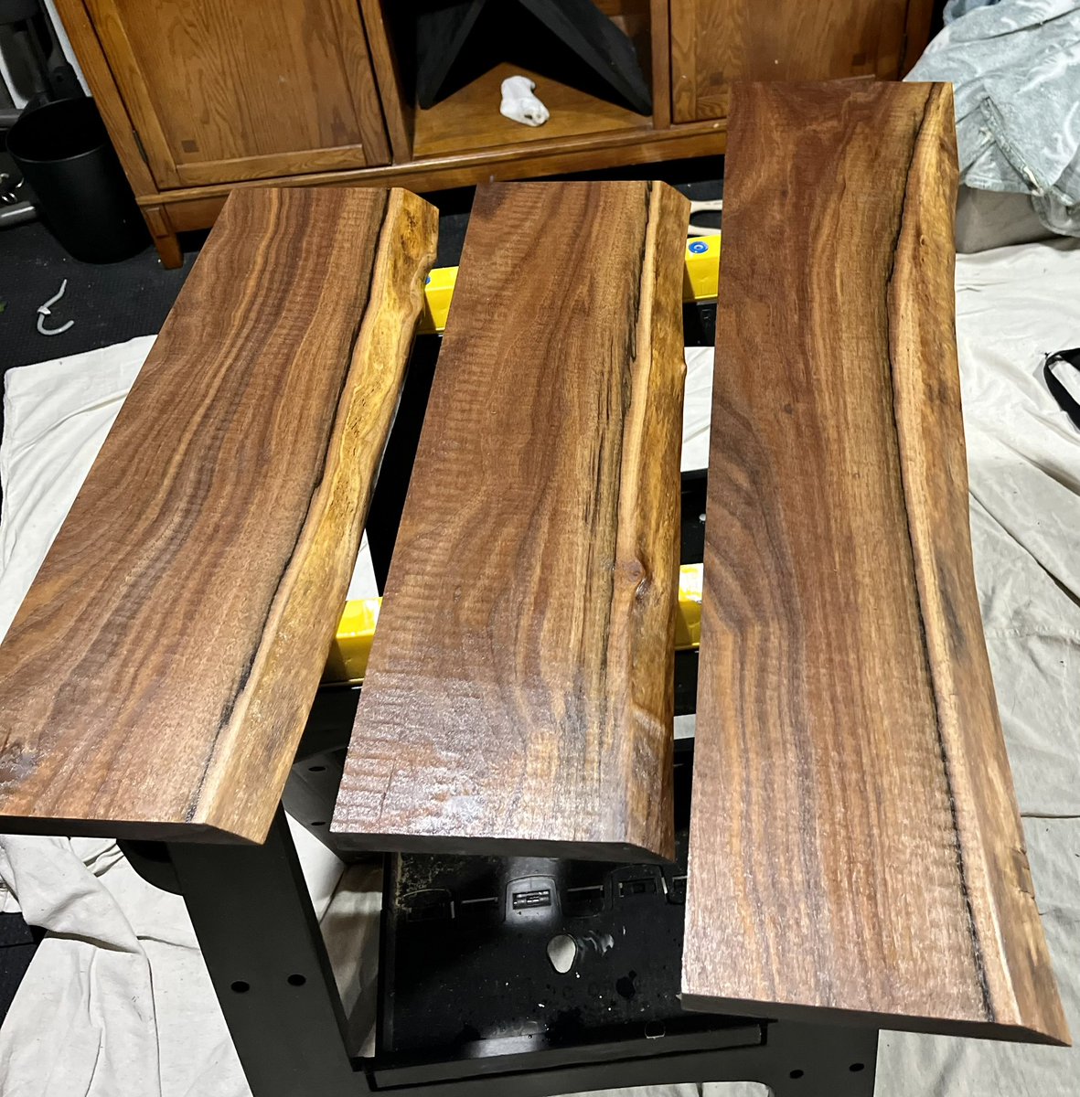 9367LLC's tweet photo. Working on some live edge rough sawn black walnut floating shelves for a customers whiskey collection! 

I love the waves created by the saw blade and damn that grain pop!

#blackwalnut #woodworking #smallbusiness 

Let us know if you’d like us to create something for you! https://t.co/BKzmt4IiXu