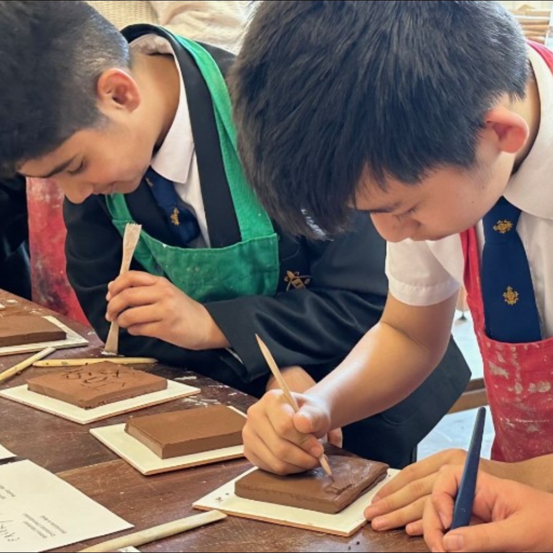 TrinityCroydon's tweet photo. It was wonderful to see how engaged students were in a collaboration between Classics and Art, where they etched words and drawings inspired by Roman graffiti into clay tiles. Read more: https://t.co/G0yqvqPRWb #TrinityClassics #TrinityArt https://t.co/ksPVjmKi7G