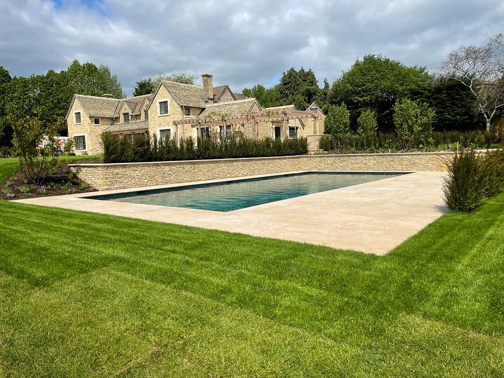 The team are delighted that it’s stopped raining long enough to complete the lawns and finishing touches of this country garden in the North Cotswolds. Well done guys, another beautiful garden.