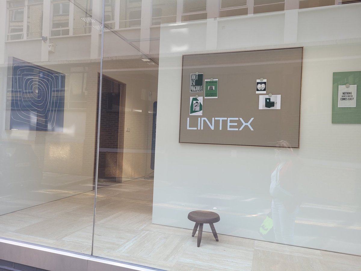 wbookman's tweet photo. Glorious sunshine in #Clerkenwell today. There's excitement in the air and lots of pink posters as the countdown is on to @CDWfestival! First glimpse of the new showroom for our clients, Lintex, too, which just adds to the fun. https://t.co/VCe2l60kI7