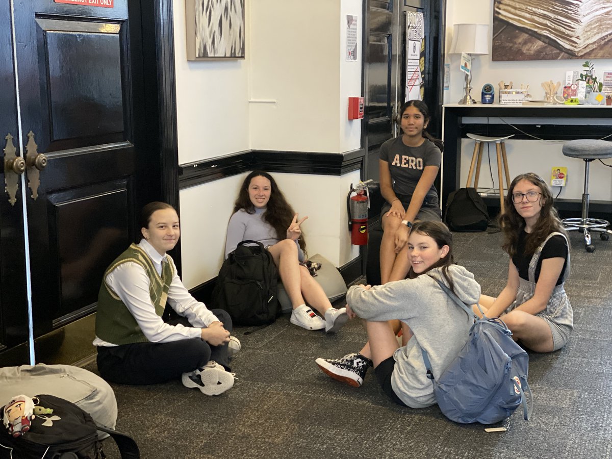 The 7th graders at <a href="/lhpsnews/">Lake Highland Preparatory School</a> are studying #TheOutsiders, and we found Socs and Greasers in the library! No rumble today; they were quizzing each other for an upcoming test. #LHPSRollLibrary #LibraryLife