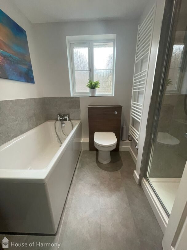 Beautiful bathroom designed and installed in Burwell.  Utopia Qube furniture in Sorrento walnut. Concealed WC unit #bathroominspo #bathroomdesign #bathroom #design #bath #shower #transformation #newbathroom

house-of-harmony.co.uk/project/bathro…
