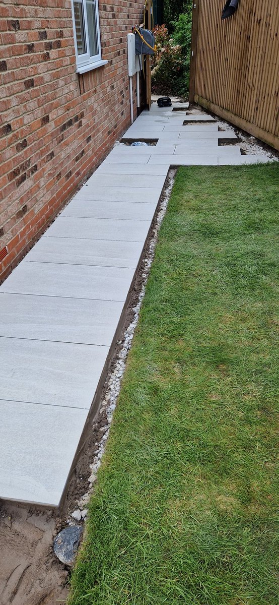 GandJLandscapes's tweet photo. Another busy day today laying the porcelain path 💪 Edgings &amp; cuts tomorrow 😃 #Nottingham #landscaping #gardedesign #Gotham #creatingyourperfectspace https://t.co/ACv8ewCRCD https://t.co/6p0tuwsmo1 https://t.co/gDbrhbJdA2