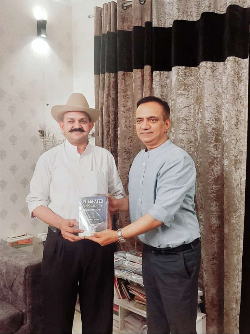 MY BOOK INTEGRATED APPROACH TO DISEASE MANAGEMENT WAS PRESENTED TO DR RAVINDRA NIRWAL.
