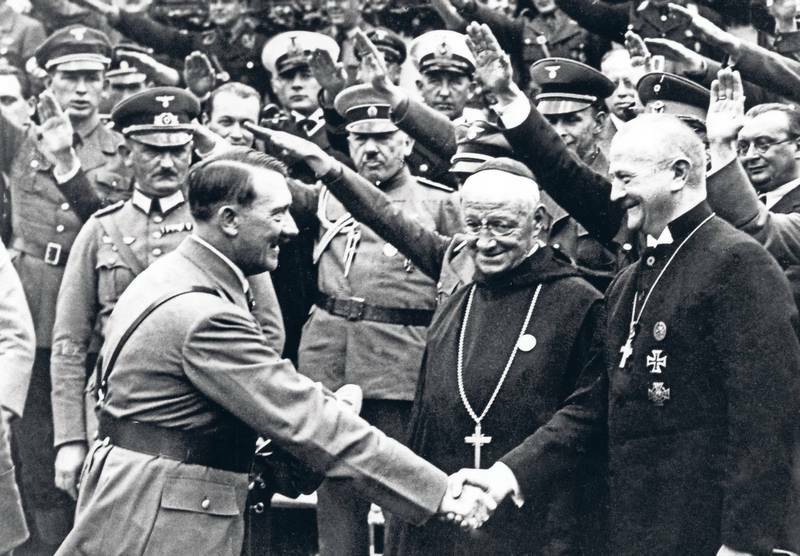 HenryMakow's tweet photo. https://t.co/6PKB4Cj7JY

Hitler in a Masonic handshake with Polish Prelate https://t.co/xYSvxmu8k1