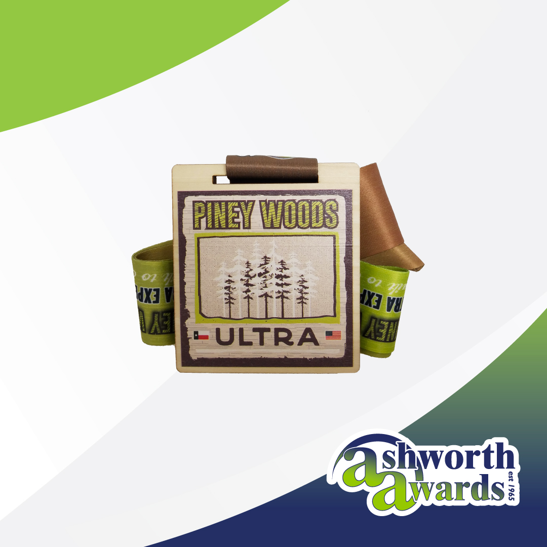 There’s nothing like the natural feel of a woodallion! We love this colorful printed design we created for the #PineyWoodsUltra presented by #UltraExpeditions. bit.ly/3AWPku7 #Awards #CustomAwards #Medal #CustomMedal #MedalDesign #RaceBling #AshworthAwards #TrailRunning