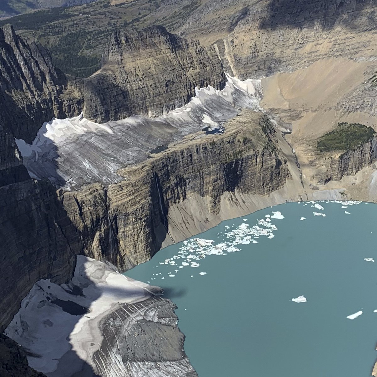 GlacierNPS's tweet photo. "The times, they are a-changin. "

Learn more on our website: https://t.co/y1TU9jUgyt

Image 1: Grinnell Glacier in 1938 by Hileman. 
Image 2: Grinnell Glacier in 1998 by Fagre. 
Image 3: Grinnell Glacier in 2019 by McKeon. 
Image 4: Grinnell Glacier in 2021 by Lombardi. https://t.co/NcxIH314pS