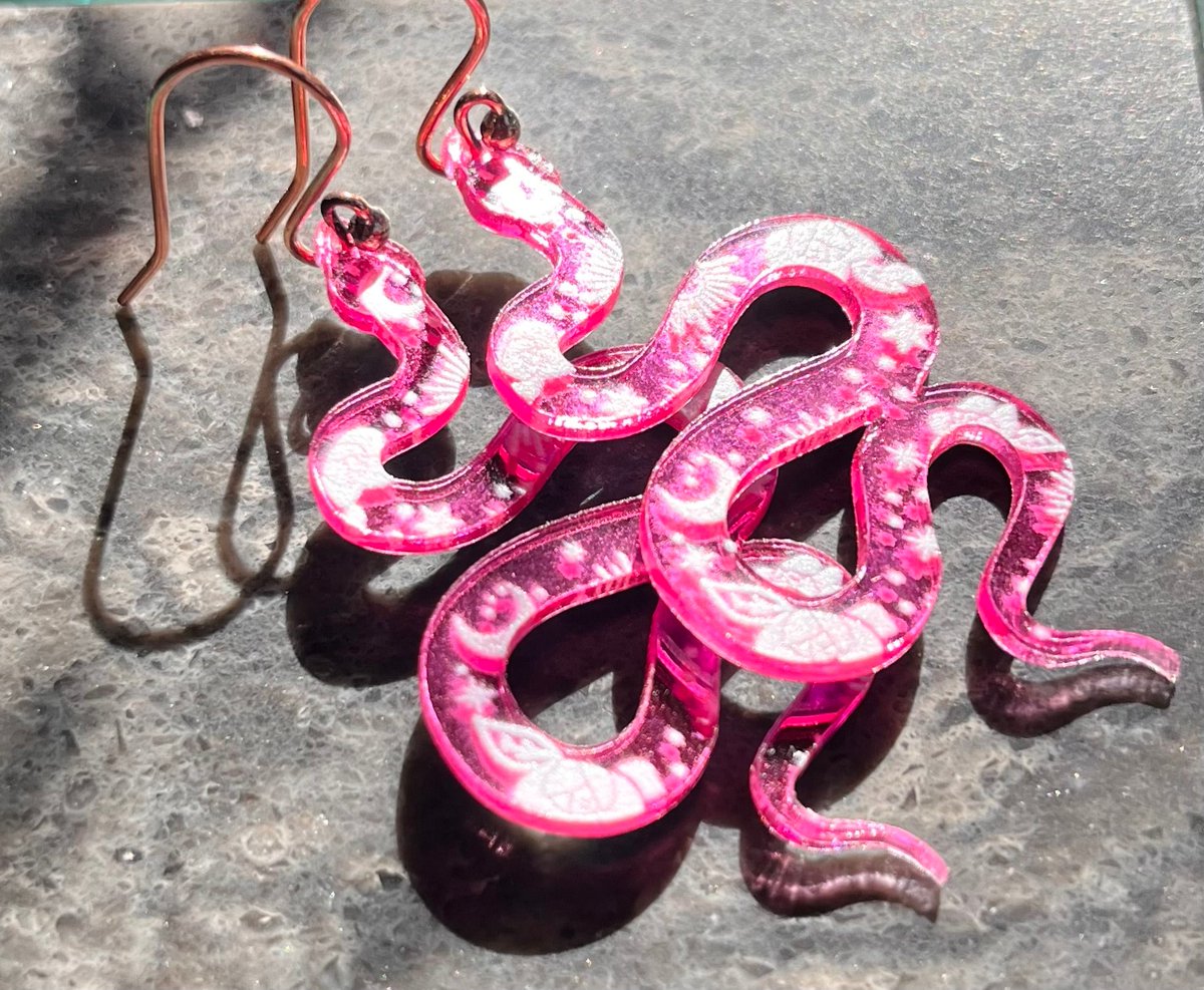 caverin1's tweet photo. Excited to share the latest addition to my #etsy shop: Pink Acrylic Snake Earrings with Sun and Moon https://t.co/ocKBNl8C77 #pink #animal #white #no #earwire #snake #shinypink #celestial #moon https://t.co/EInJ9OYBLX