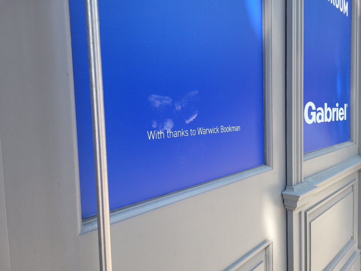 wbookman's tweet photo. Guessing it will be about the last time to stop and visit the kind tribute to Warwick on the door of the new Gabriel showroom. This has been so much appreciated and a comfort in a way, too. I'll really miss it. https://t.co/4AQoWaoQop