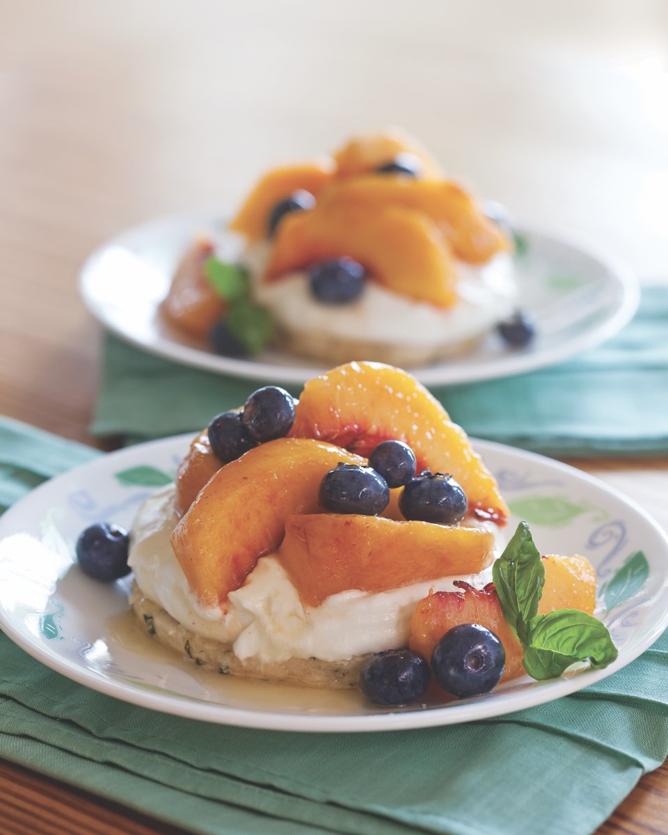 SouthernLadyMag's tweet photo. Filled with the flavors of a summer garden, basil shortcakes topped with peaches, blueberries, and a dollop of honeyed goat cheese are a grand finale. See the recipe at https://t.co/hVQ21sFxDS.
#southernladymag #recipebox #shortcakes #basil #peaches #blueberries #desserts https://t.co/LRiPaVnK0n