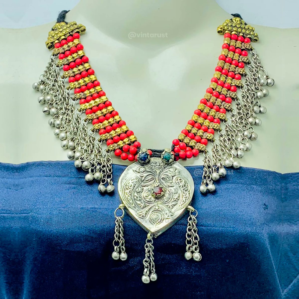 Beaded Chain Necklace With Silver Pendant. 

Shop Now:
buff.ly/42yBXwd

#multilayernecklace #redbeadedchain #handmadejewelry #tribalornament #statementnecklace #versatileaccessory #bohemianstyle #chiclook #silverchain #elegantaccessory #vintarust #fashion #jewelry #trendy
