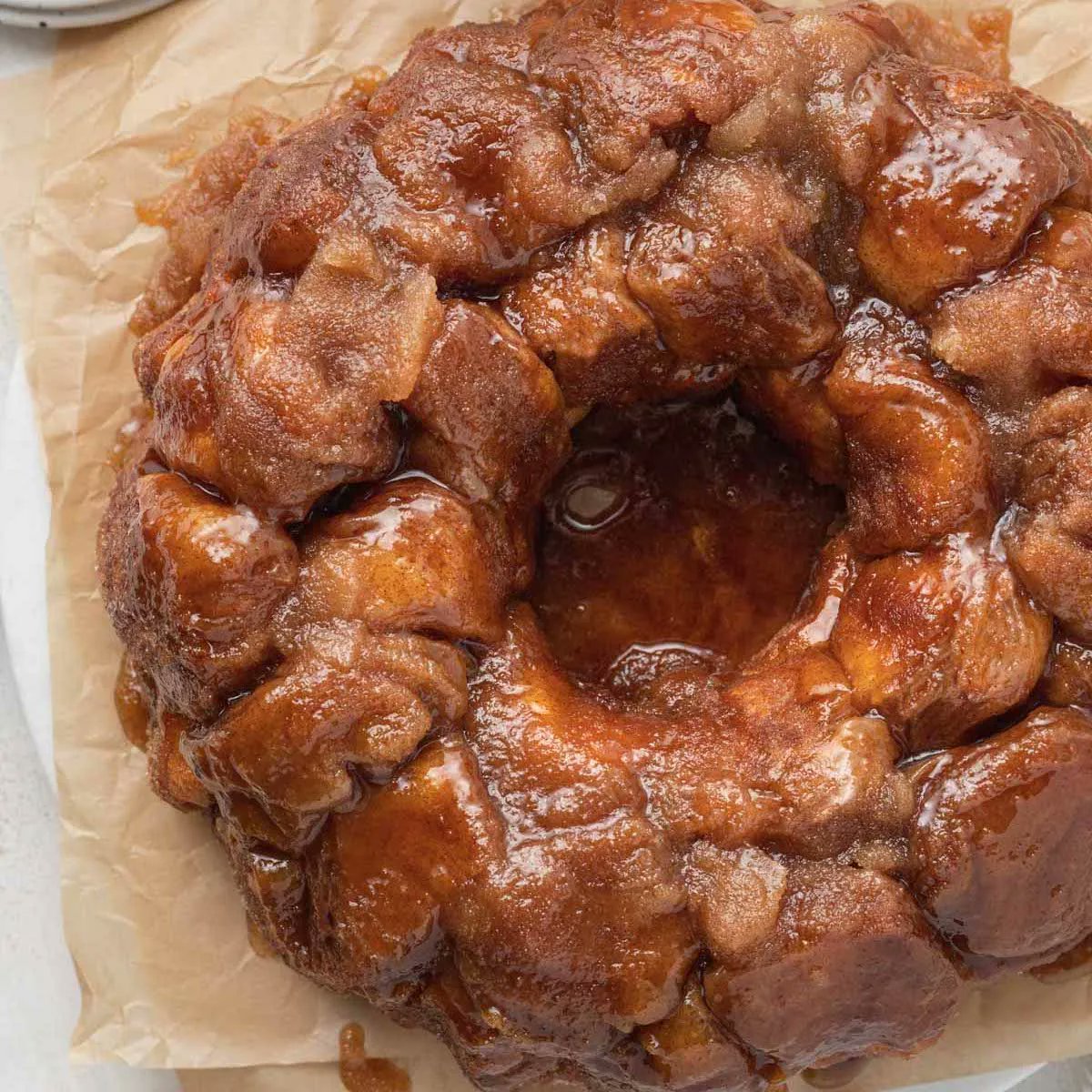 Monkey bread is a pull-apart bread that’s coated in a gooey caramel sauce. Instead of using canned biscuits, I made the monkey bread dough completely from scratch! #monkeybread #pullapartbread #baking #caramelsauce buff.ly/3mMOitz