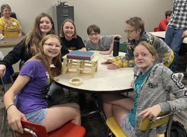 Circle of Friends kids built bridges out of popsicle sticks and tape that had to be 6 inches tall and 12 inches long.