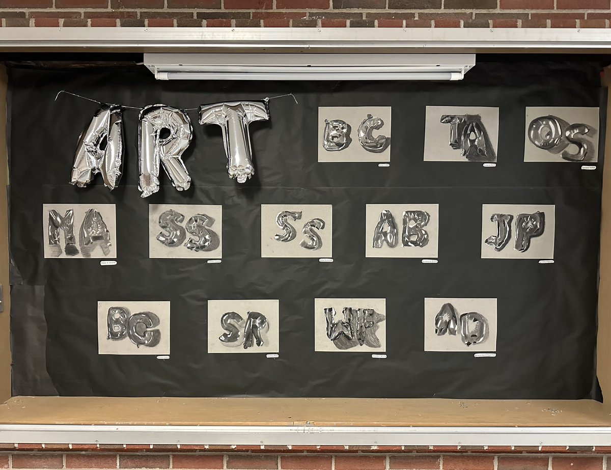 Art 8+ works HARD! First they took photographs of mylar balloons. Then did their best to draw their initials exactly as pictured, they transferred their drawing to charcoal paper and shaded in their drawings using black and white charcoal pencils. <a href="/PrincipalDauria/">Marissa Dauria</a>