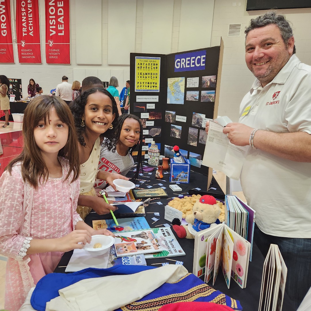 SAES's tweet photo. Lower School students enjoyed a trip around the world - from the convenience of Lions Court - during the Family Heritage Festival. Thank you to the many families who represented a variety of countries and cultures through decorated tables, food, activities, and performances. https://t.co/RUzz7sivPO