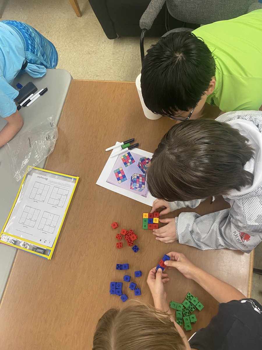 LockeMiddle's tweet image. Grade 5 students are building problem-solving skills as they make connections between 2 and 3 dimensional representations of solids to construct a model.