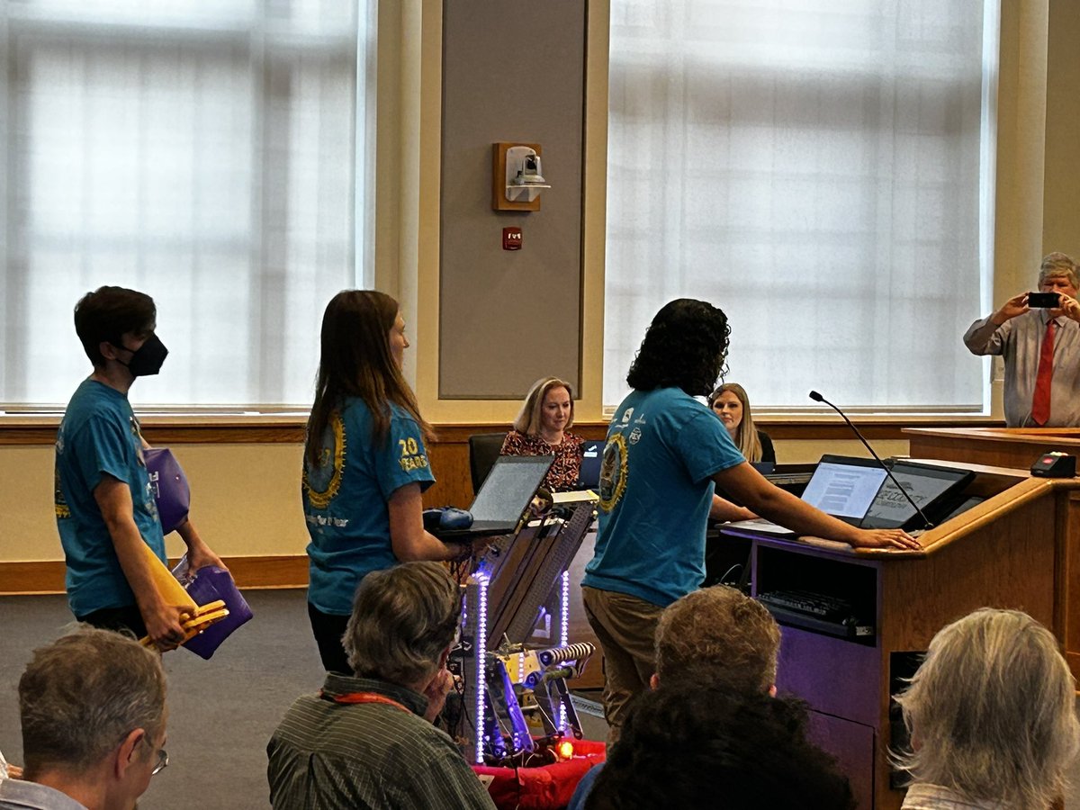 Receiving the Orange County Commissioner’s Proclamation with our fellow County robot teams, FRC4795 Eastbots, FRC4829 Titanium Tigers, FRC7763 CarrboRobotics. We all spoke about our season and how <a href="/FIRSTweets/">FIRST</a> is more then just robots by highlighting our outreach events.