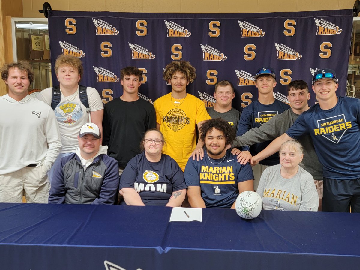 Kolbey Siler, surrounded by teammates, family and Coach Helman signs to attend Marian University where he will play Rugby for the Knights! #WinTogether!
