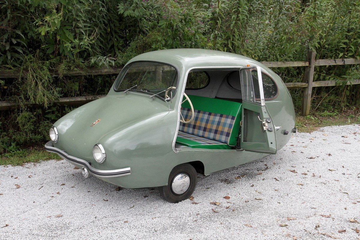 This #quirky #1950s #Fuldamobil NFW200 #microcar has a 200cc 1 cylinder engine & #funky #plaid seats