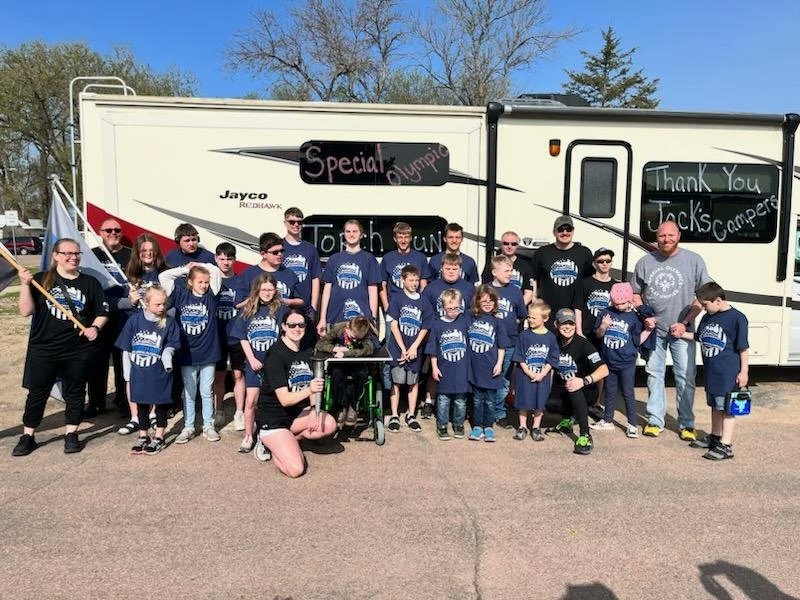 CastlewoodUCS's tweet photo. The Law Enforcement Torch Run made a special appearance in Castlewood today! We had many of our NESC Rockets join us to carry the torch past supportive Castlewood students and staff. Thank you for everyone who made it out! @SOSouthDakota @SDLETR https://t.co/x2mxTWHLVF