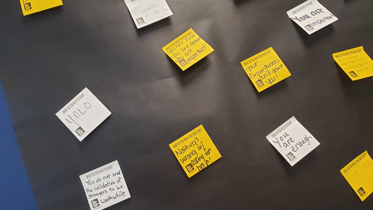 Hyltoncares's tweet photo. Our favorite part of #betweenthebells from @TWLOHA is the Response Wall - we love to watch it grow throughout the week and give our students (and staff!) the space to share their thoughts so freely without judgment and learning they are not alone in this journey 🖤💛🖤 https://t.co/riiMzrnu7W