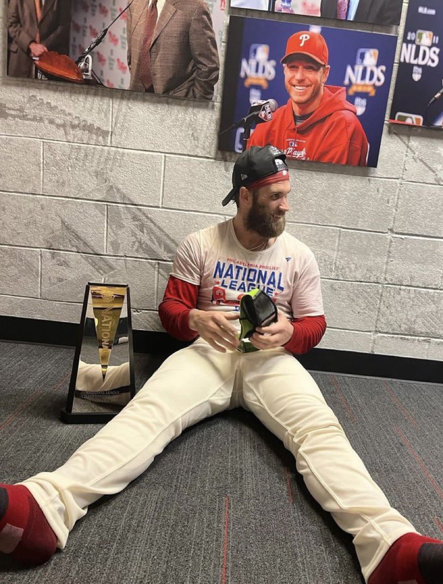 Bryce Harper in the clubhouse after helping the Phillies clinch the NL pennant