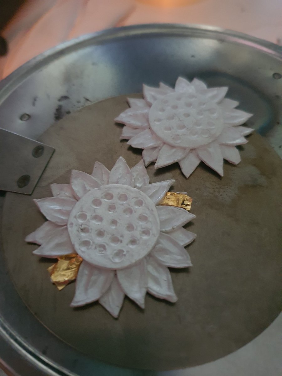 Today we're doing physics, transferring gold atoms to silver, using pressure and heat! I've already burned my self twice! So once for every petal!