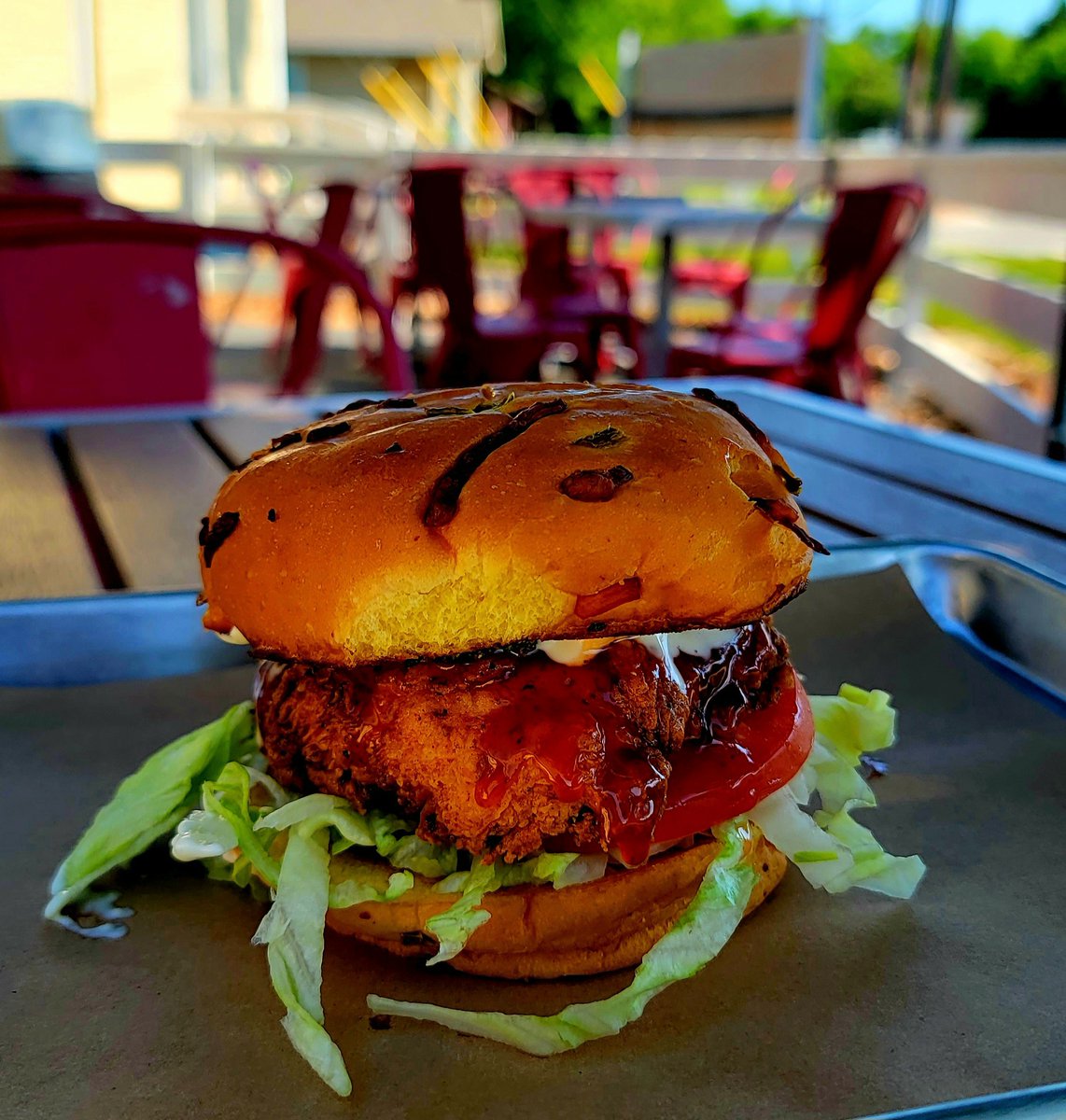 TheMeatUpTX's tweet photo. Try our Hot Honey Chicken sandwich on the patio today!   👀  👀 https://t.co/Rj7Kk2ADPz