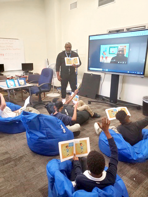 AlcPanthers's tweet photo. Florida Author, Farrah Donaldson, hosts an interactive session with our elementary M&amp;M's boys club! The kids love his books and want to see more of "What will LaRay do today" Diverse authors are important! @fldizzle79 @LearnLuv2 @TheExecEFFECT @AliefISD @AlcPanthers #Aliefleads https://t.co/sSIGLZphCg