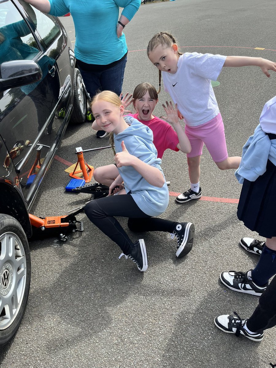 Primary 7 are having a fantastic morning with Tyler and Claire from @womenstec learning all about car maintenance. They have changed a tyre, checked the oil levels and even learnt how to jump start the car! Super learning for our girls #notjustforboys