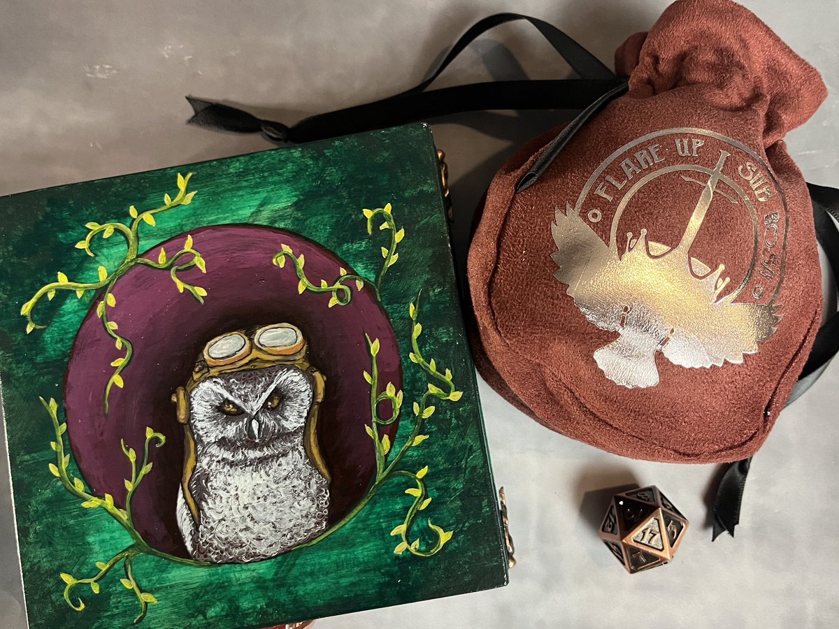 Nerfblat's tweet photo. @jackson_pope @codeNCardboard @Wojtowicz_N @rf_seattle @crazyhawkgames @ReflectiveTree @The_Prototyper @anarchytabletop @WingedFiveGames @amgsmith @BSoMT_2018 @JonTexMo @Raven_elf I finished designing the crest for this dice bag that my sister made to match the steampunk owl dice box/tray I made. Also finished the dice display islands I’d been working on just in time to take them to the expo. Happy #CraftWednesday folks!! https://t.co/1PRzxdbhtB