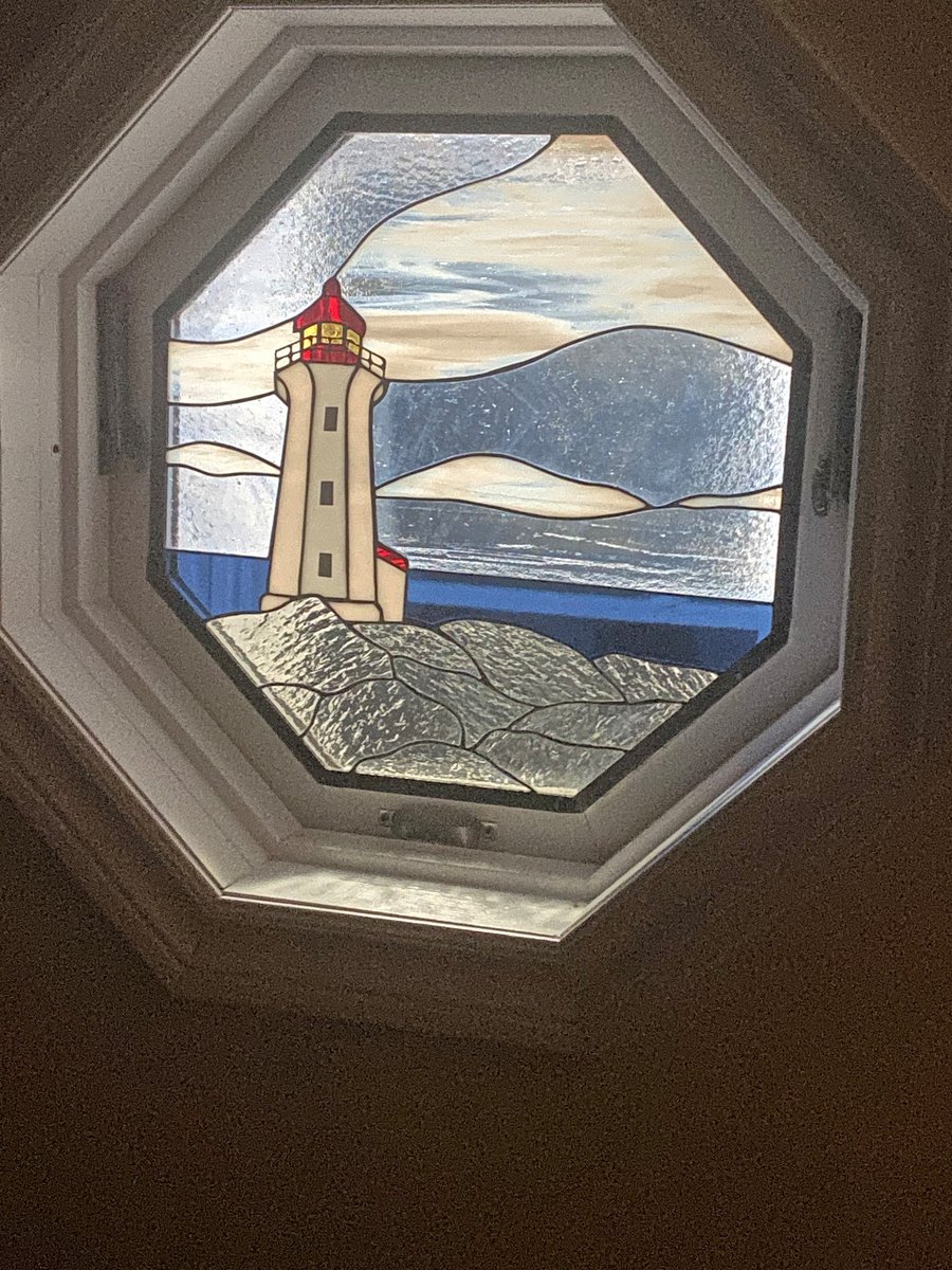 Love when customers send a pic of my #stainedlgass work installed in its place!
 Getting a pic later, allows me to step back & enjoy the view! 
When I'm working in it, I am focused on construction & color arrangement. 
This was a nice surprise ! #lighthouse #artist #halifaxns