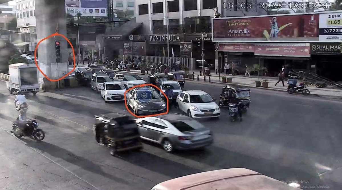 Kewal__M's tweet photo. The cars coming from the opposite road broke the signal (signal circled). We had to stop our car (car circled) to avoid an accident, even though our signal was green &amp; we got a fine for stopping ahead of the line!!!

Is there a way to reverse this challan?
@MumbaiPolice https://t.co/7lCyW7vAjR