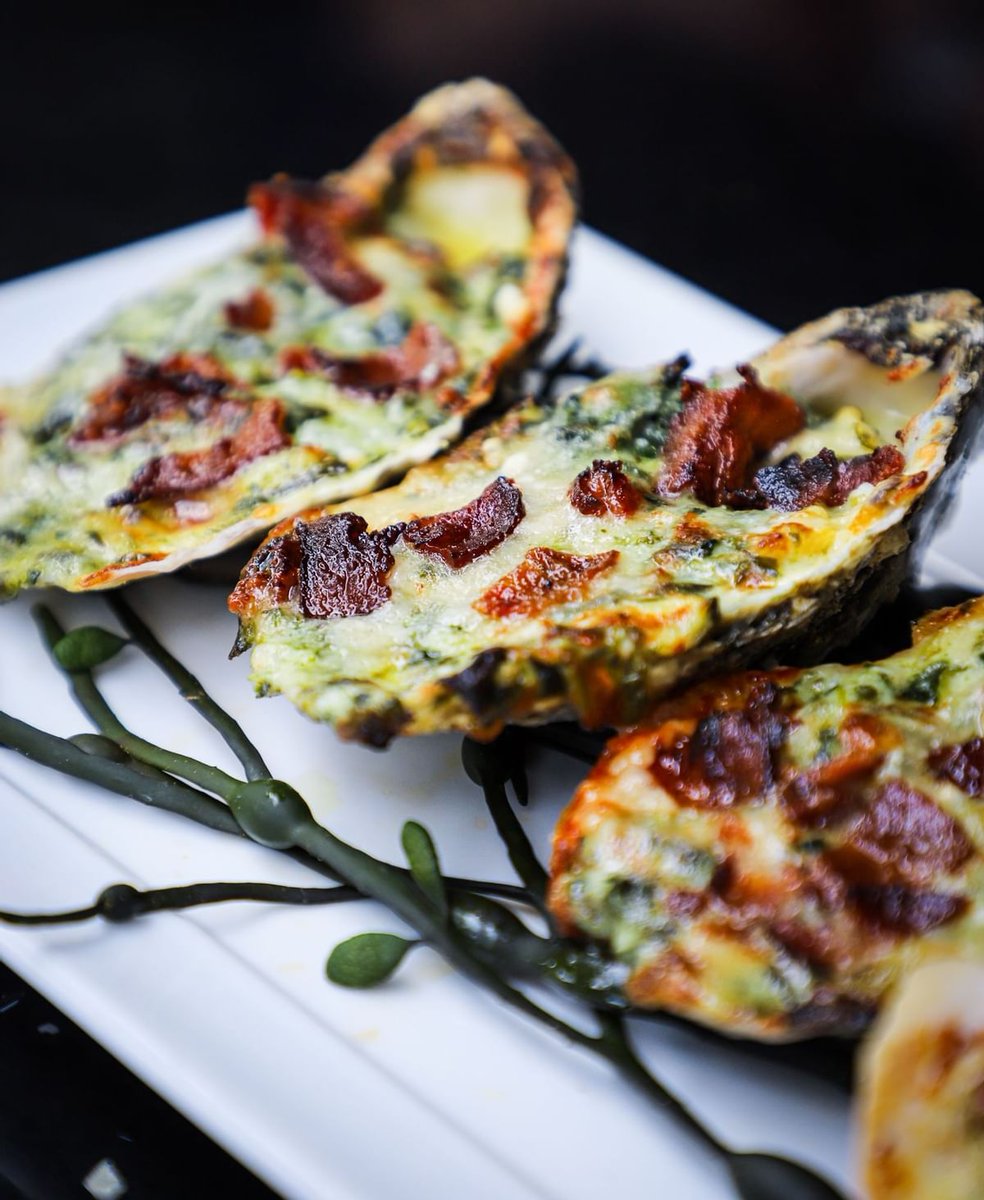 Baked oysters with bacon, creamy spinach and parmigiano reggiano? Yes, please! #WildSea #LasOlas #RiversideHotel