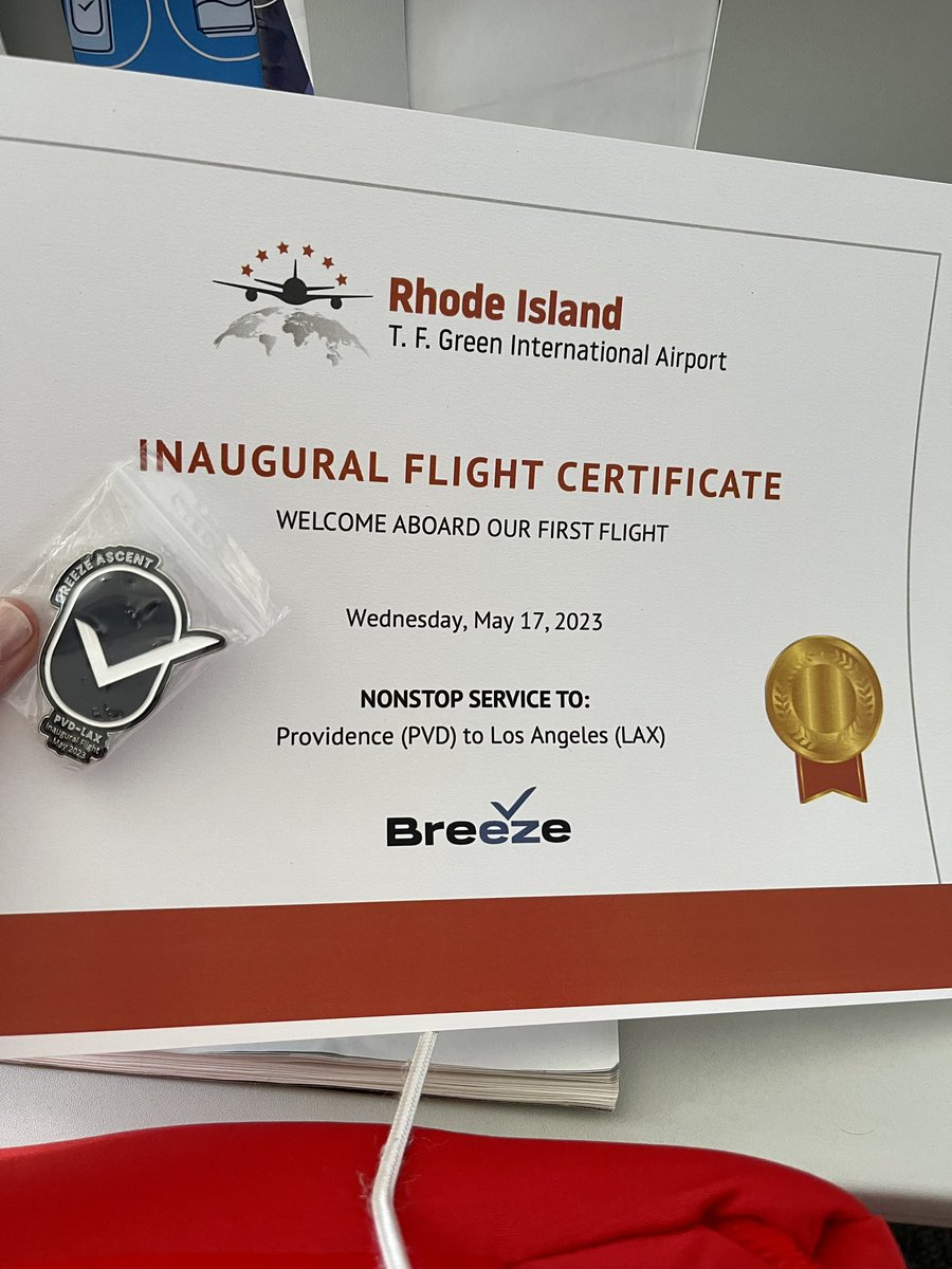khanlon's tweet photo. @BreezeAirways I’m tweeting live from the inaugural PVD to LAX flight! Celebrations at Gate 8 followed by a media and fire truck send off on the runway - and the celebratory mood continues onboard! #RhodeIsland #LosAngeles https://t.co/03zUfYawfM