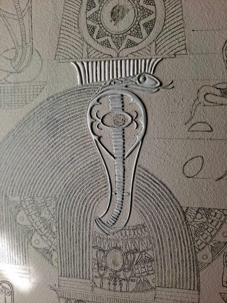 Ptahmassu's tweet image. Progress on the Akem-Shield of Renenutet Mistress of Souls. Her cobra head is sufficiently built though not finished, but I've moved on to Her horned and feathered crown, which will eventually be gilded in 22kt gold and platinum. iconsofkmt.com